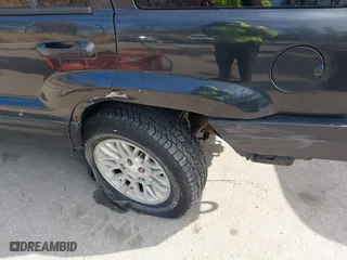 2004 Jeep Grand Cherokee Limited with VIN 1J4GW58N74C120435, listed as a IAAI auction lot 41815094 with 193,056 mi miles. Bid and sale history available at carsss.com. Image 6.
