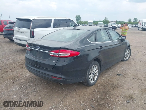 2017 Ford Fusion SE z VIN 3FA6P0H73HR283356, wystawiony jako IAAI lot #42416078 z przebiegiem 52 337 mil mil oraz . Historia ofert i sprzedaży dostępna na DreamBid. Obrazek 4.
