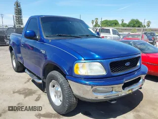 1997 Ford F-150 z VIN 2FTDF08W0VCA88444, wystawiony jako IAAI lot #42004510 z przebiegiem 134 446 mil mil oraz . Historia ofert i sprzedaży dostępna na DreamBid. Obrazek 1.