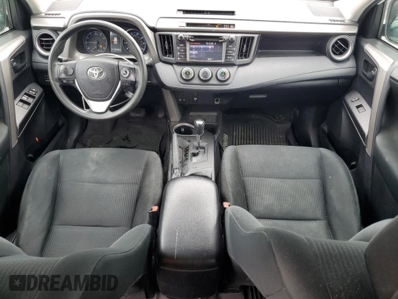 2018 Toyota RAV4 LE with VIN 2T3BFREV2JW853108, listed as a Copart auction lot 61245795 with 174,196 mi miles and Salvage title. Bid and sale history available at DreamBid. Image 8.