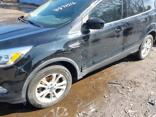2018 Ford Escape SE with VIN 1FMCU0GD2JUA65979, listed as a IAAI auction lot 41894516 with 145,424 mi miles. Bid and sale history available at carsss.com. Image 6.