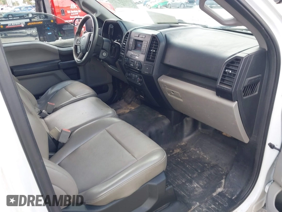 2018 Ford F-150 XL with VIN 1FTMF1CB0JFE21234, listed as a IAAI auction lot 42605399 with 243,035 mi miles and . Bid and sale history available at DreamBid. Image 5.