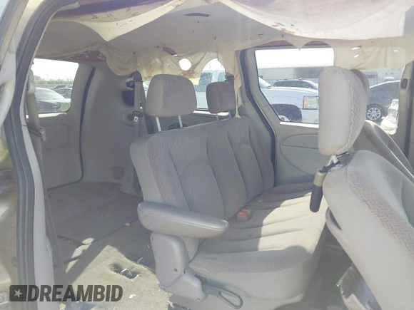 2007 Dodge Grand Caravan SE with VIN 1D4GP24R57B159225, listed as a IAAI auction lot 41807982 with 141,439 mi miles and . Bid and sale history available at DreamBid. Image 8.