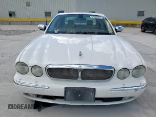 2006 Jaguar XJ Vanden Plas with VIN SAJWA82B16SH06996, listed as a Copart auction lot 62509025 with 80,236 mi miles and Salvage title. Bid and sale history available at DreamBid. Image 5.