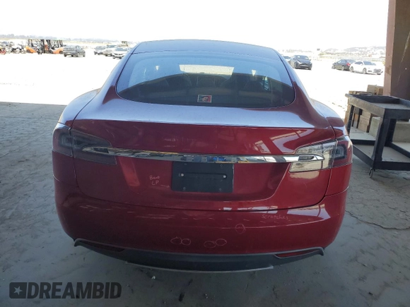 2013 Tesla Model S with VIN 5YJSA1AG5DFP12177, listed as a Copart auction lot 61846195 with 130,668 mi miles and Salvage title. Bid and sale history available at DreamBid. Image 6.