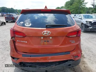 2017 Hyundai Santa Fe 2.4L z VIN 5XYZUDLB1HG463416, wystawiony jako IAAI lot #42546637 z przebiegiem 81 963 mil mil oraz . Historia ofert i sprzedaży dostępna na DreamBid. Obrazek 16.
