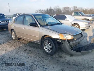 2002 Honda Civic LX with VIN 2HGES15592H562781, listed as a IAAI auction lot 41649654 with 260,435 mi miles. Bid and sale history available at carsss.com. Image 1.