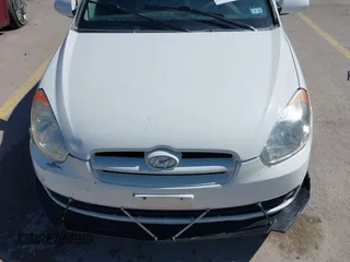2007 Hyundai Accent GS with VIN KMHCM36C47U050161, listed as a IAAI auction lot 41762927 with 111,684 mi miles. Bid and sale history available at carsss.com. Image 12.