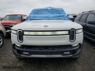 2023 Rivian R1S Adventure with VIN 7PDSGABA6PN017889, listed as a Copart auction lot 68860864 with 7,661 mi miles and Salvage Title. Bid and sale history available at carsss.com. Image 5.