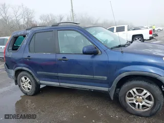 2003 Honda CR-V EX with VIN SHSRD78863U110869, listed as a IAAI auction lot 41612374 with 221,200 mi miles. Bid and sale history available at carsss.com. Image 13.