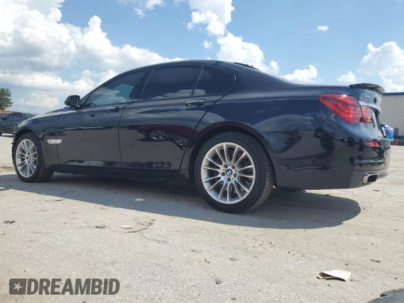 2014 BMW 7 Series 750i xDrive with VIN WBAYB6C53ED225212, listed as a Copart auction lot 71866424 with 122,567 mi miles and Salvage Title. Bid and sale history available at carsss.com. Image 2.