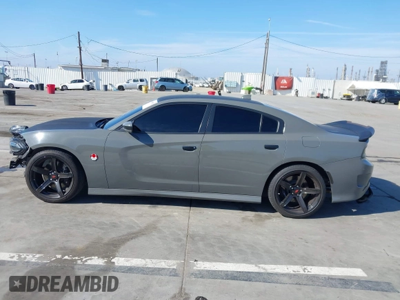 2019 Dodge Charger Scat Pack with VIN 2C3CDXGJ4KH576394, listed as a IAAI auction lot 41846702 with 70,209 mi miles and . Bid and sale history available at DreamBid. Image 14.