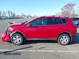 2014 Toyota RAV4 LE with VIN 2T3BFREV6EW227423, listed as a IAAI auction lot 42060083 with 87,215 mi miles and . Bid and sale history available at DreamBid. Image 14.