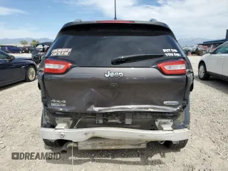2018 Jeep Cherokee Latitude Plus with VIN 1C4PJMLX0JD562180, listed as a Copart auction lot 57631285 with 105,923 mi miles and Salvage title. Bid and sale history available at DreamBid. Image 6.