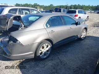 2012 Ford Fusion SE with VIN 3FAHP0HA9CR428400, listed as a IAAI auction lot 42556569 with 205,285 mi miles and . Bid and sale history available at DreamBid. Image 4.