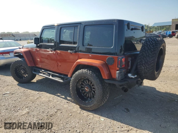 2012 Jeep Wrangler Unlimited Sport with VIN 1C4BJWDG0CL200802, listed as a Copart auction lot 63822365 with 116,501 mi miles and Salvage title. Bid and sale history available at DreamBid. Image 2.