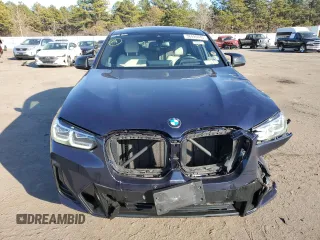 2022 BMW X4 M40i z VIN 5UX43DT02N9K31818, wystawiony jako Copart lot #38495943 z przebiegiem 12 673 mil mil oraz . Historia ofert i sprzedaży dostępna na DreamBid. Obrazek 5.