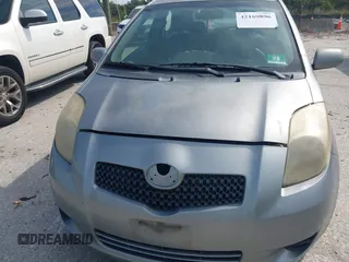 2008 Toyota Yaris with VIN JTDJT923185180160, listed as a IAAI auction lot 42169896 with 340,931 mi miles. Bid and sale history available at carsss.com. Image 6.