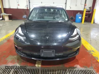2023 Tesla Model 3 z VIN 5YJ3E1EA4PF451241, wystawiony jako Copart lot #61045835 z przebiegiem 69 738 mil mil oraz Czysty tytuł • Clean title. Historia ofert i sprzedaży dostępna na DreamBid. Obrazek 5.
