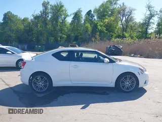 2011 Scion tC z VIN JTKJF5C73B3013201, wystawiony jako IAAI lot #42137431 z przebiegiem 157 352 mil mil oraz . Historia ofert i sprzedaży dostępna na DreamBid. Obrazek 13.