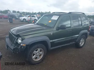 2006 Jeep Liberty Sport with VIN 1J4GL48K76W288408, listed as a IAAI auction lot 39990700 with 215,716 mi miles. Bid and sale history available at carsss.com. Image 17.