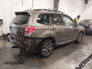 2017 Subaru Forester Touring with VIN JF2SJGTC4HH558808, listed as a IAAI auction lot 41565049 with 79,713 mi miles. Bid and sale history available at carsss.com. Image 4.