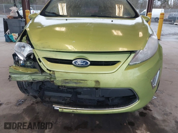2011 Ford Fiesta SES with VIN 3FADP4FJ7BM127600, listed as a IAAI auction lot 41657170 with 135,483 mi miles. Bid and sale history available at carsss.com. Image 6.