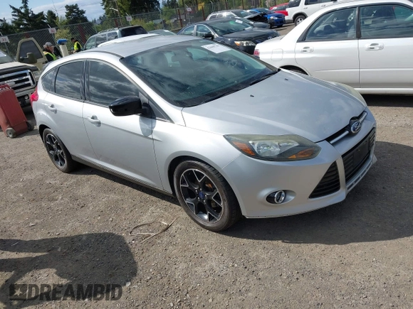 2013 Ford Focus SE with VIN 1FADP3K25DL335939, listed as a IAAI auction lot 42088780 with 149,957 mi miles. Bid and sale history available at carsss.com. Image 1.