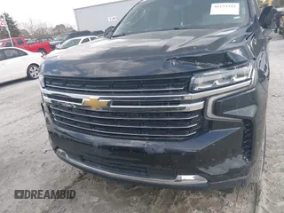 2021 Chevrolet Tahoe LT z VIN 1GNSCNKD8MR248213, wystawiony jako IAAI lot #41173322 z przebiegiem 121 393 mil mil oraz . Historia ofert i sprzedaży dostępna na DreamBid. Obrazek 12.