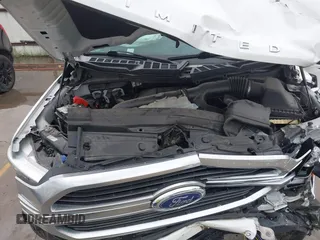 2021 Ford F-150 XL with VIN 1FTFW1E8XMFA69505, listed as a IAAI auction lot 42446323 with 58,214 mi miles and . Bid and sale history available at DreamBid. Image 10.