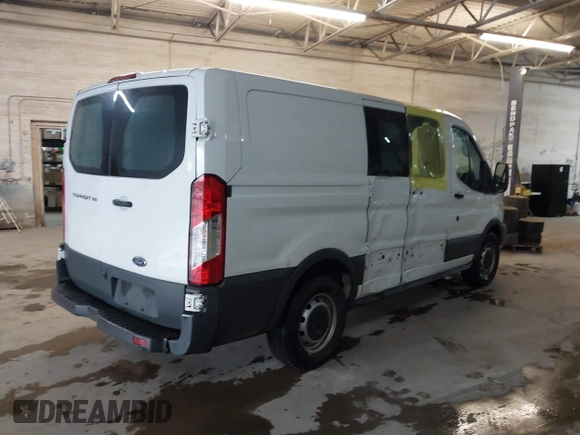 2018 Ford Transit with VIN 1FTYE1ZM2JKB30853, listed as a IAAI auction lot 42025674 with 188,545 mi miles and . Bid and sale history available at DreamBid. Image 4.