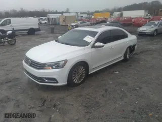 2016 Volkswagen Passat 1.8T SE with VIN 1VWBT7A30GC009174, listed as a IAAI auction lot 41562328 with NaN miles. Bid and sale history available at carsss.com. Image 18.