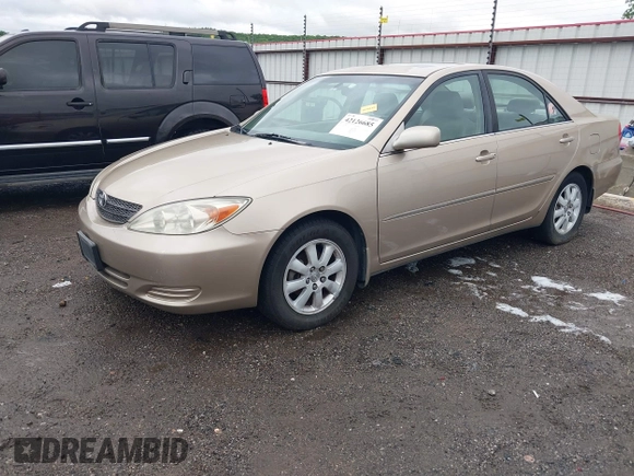 2002 Toyota Camry LE z VIN 4T1BE32K52U086150, wystawiony jako IAAI lot #42126685 z przebiegiem 175 212 mil mil oraz . Historia ofert i sprzedaży dostępna na DreamBid. Obrazek 17.