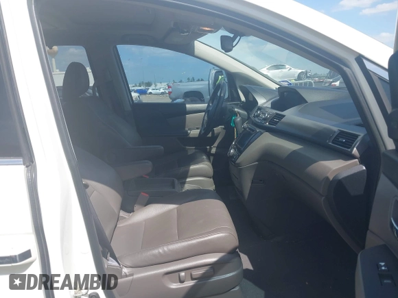 2016 Honda Odyssey Touring Elite with VIN 5FNRL5H98GB102544, listed as a IAAI auction lot 42040050 with 128,957 mi miles and . Bid and sale history available at DreamBid. Image 5.