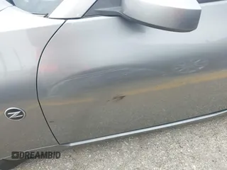 2006 Nissan 350Z Touring z VIN JN1AZ34D56M331590, wystawiony jako IAAI lot #42361928 z przebiegiem Nie podano mil oraz . Historia ofert i sprzedaży dostępna na DreamBid. Obrazek 15.