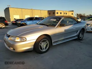 1998 Ford Mustang with VIN 1FAFP4444WF212096, listed as a Copart auction lot 87106074 with 107,664 mi miles and Clean Title. Bid and sale history available at carsss.com. Image 1.