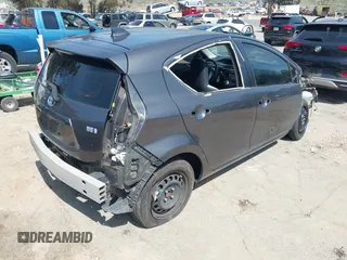 2015 Toyota Prius One with VIN JTDKDTB30F1585994, listed as a IAAI auction lot 41866915 with 99,771 mi miles and . Bid and sale history available at carsss.com. Image 4.