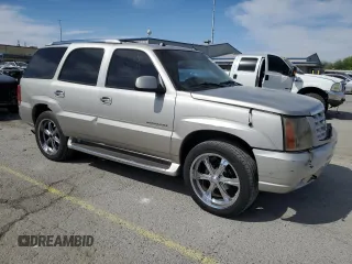 2004 Cadillac Escalade z VIN 1GYEC63T44R235759, wystawiony jako Copart lot #53166755 z przebiegiem 212 034 mil mil oraz Szkody całkowita. Historia ofert i sprzedaży dostępna na DreamBid. Obrazek 4.