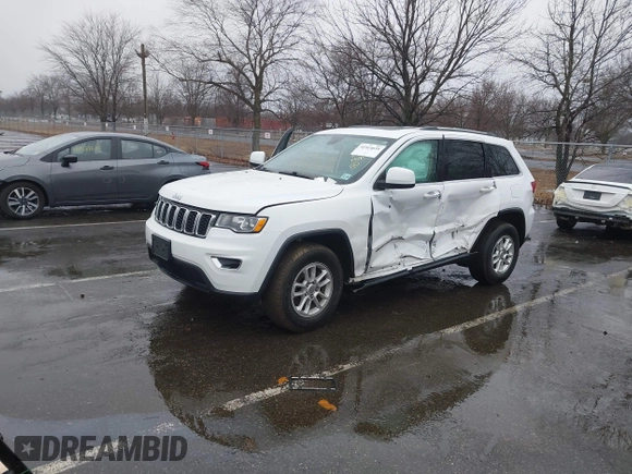 2020 Jeep Grand Cherokee Altitude with VIN 1C4RJFAG2LC237045, listed as a IAAI auction lot 41514039 with 82,859 mi miles. Bid and sale history available at carsss.com. Image 2.