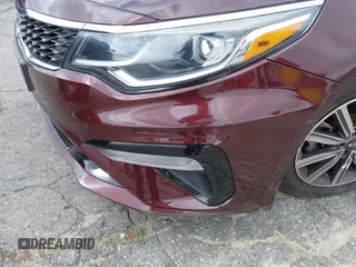 2019 Kia Optima LX z VIN 5XXGT4L37KG354649, wystawiony jako IAAI lot #42130410 z przebiegiem 61 315 mil mil oraz . Historia ofert i sprzedaży dostępna na DreamBid. Obrazek 6.