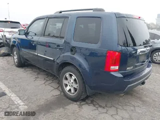 2010 Honda Pilot Touring with VIN 5FNYF4H80AB039371, listed as a IAAI auction lot 41817424 with 202,306 mi miles. Bid and sale history available at carsss.com. Image 3.