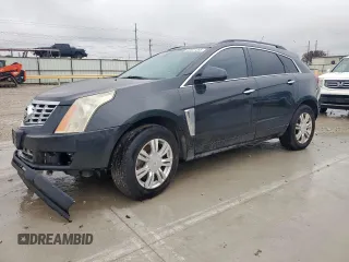 2015 Cadillac SRX z VIN 3GYFNAE36FS598790, wystawiony jako Copart lot #60527285 z przebiegiem 154 883 mil mil oraz Czysty tytuł • Clean title. Historia ofert i sprzedaży dostępna na DreamBid. Obrazek 1.