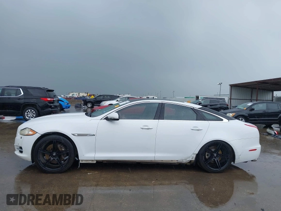 2012 Jaguar XJ with VIN SAJWA1CB7CLV35339, listed as a IAAI auction lot 41945850 with 123,501 mi miles and . Bid and sale history available at DreamBid. Image 15.