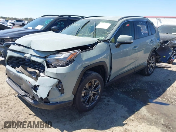 2023 Toyota RAV4 Hybrid XLE Premium z VIN JTMB6RFV8PD116502, wystawiony jako IAAI lot #41888174 z przebiegiem 19 253 mil mil oraz . Historia ofert i sprzedaży dostępna na DreamBid. Obrazek 2.