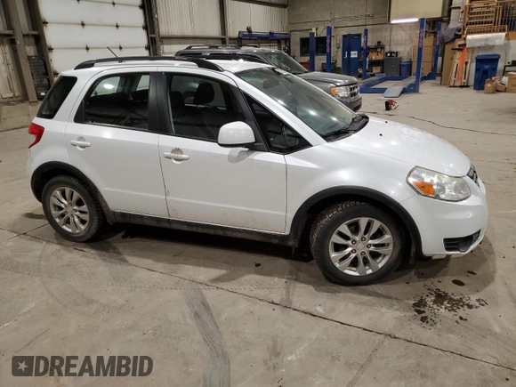 2013 Suzuki SX4 Crossover z VIN JS2YB5A30D6102684, wystawiony jako Copart lot #88725715 z przebiegiem 104 023 mil mil oraz Szkoda całkowita • Salvage title. Historia ofert i sprzedaży dostępna na DreamBid. Obrazek 4.