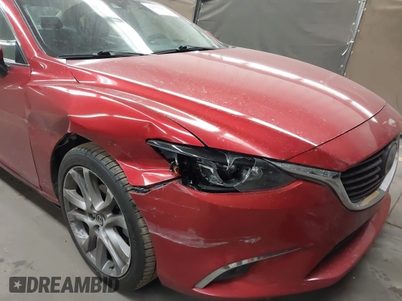 2016 Mazda 6 i Grand Touring с VIN JM1GJ1W50G1474054, выставлен на аукционе IAAI как лот 42162163 с пробегом 97 169 миль миль и . История ставок и продаж доступна на DreamBid. Изображение 6.