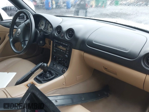 2002 Mazda MX-5 Miata Cloth z VIN JM1NB353420221527, wystawiony jako IAAI lot #41909623 z przebiegiem 90 260 mil mil oraz . Historia ofert i sprzedaży dostępna na DreamBid. Obrazek 5.