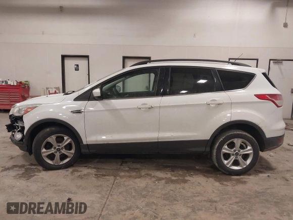 2016 Ford Escape SE with VIN 1FMCU9GX9GUC69153, listed as a IAAI auction lot 41504167 with 149,115 mi miles and . Bid and sale history available at DreamBid. Image 14.