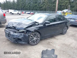 2016 Volkswagen Jetta Sport z VIN 3VWD17AJ1GM290252, wystawiony jako IAAI lot #41947953 z przebiegiem 125 484 mil mil oraz . Historia ofert i sprzedaży dostępna na DreamBid. Obrazek 17.
