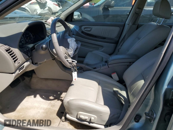 2002 Nissan Maxima GLE z VIN JN1DA31A92T302785, wystawiony jako Copart lot #57310725 z przebiegiem 95 192 mil mil oraz Szkoda całkowita • Salvage title. Historia ofert i sprzedaży dostępna na DreamBid. Obrazek 7.